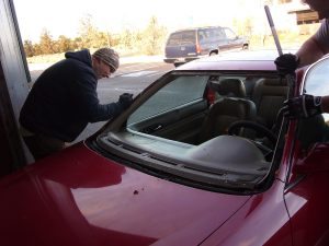 Rimrock Autoglass preparing to replace a broken windsheild